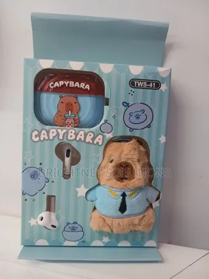 Capybara-Themed Wireless Earphones Packaged With a Plush Keychain.