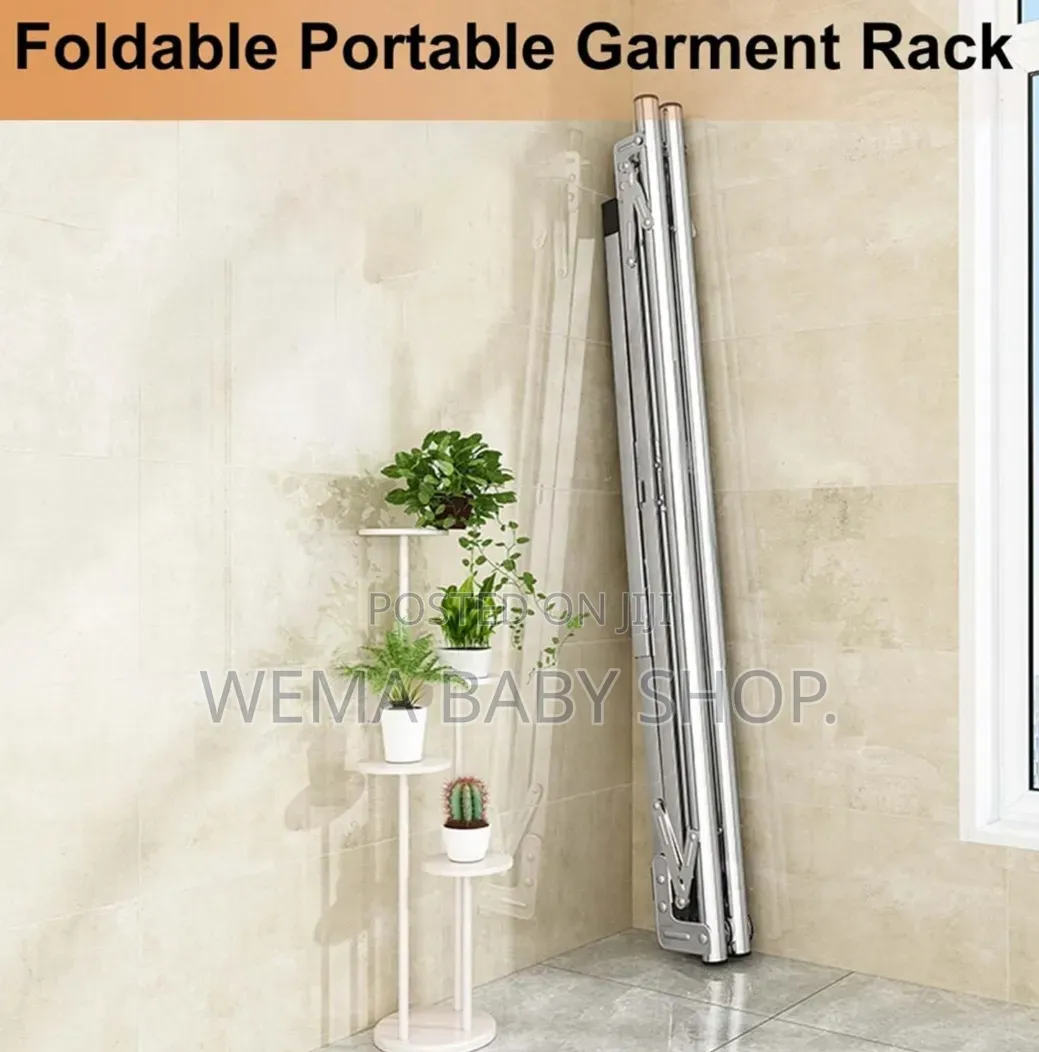 Stainless Steel Foldable and Extendable Clothes Drying Rack Upto 2.4m)
