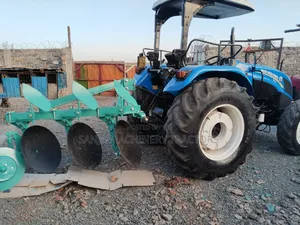 New Holland Tractor 490 Plus Plough
