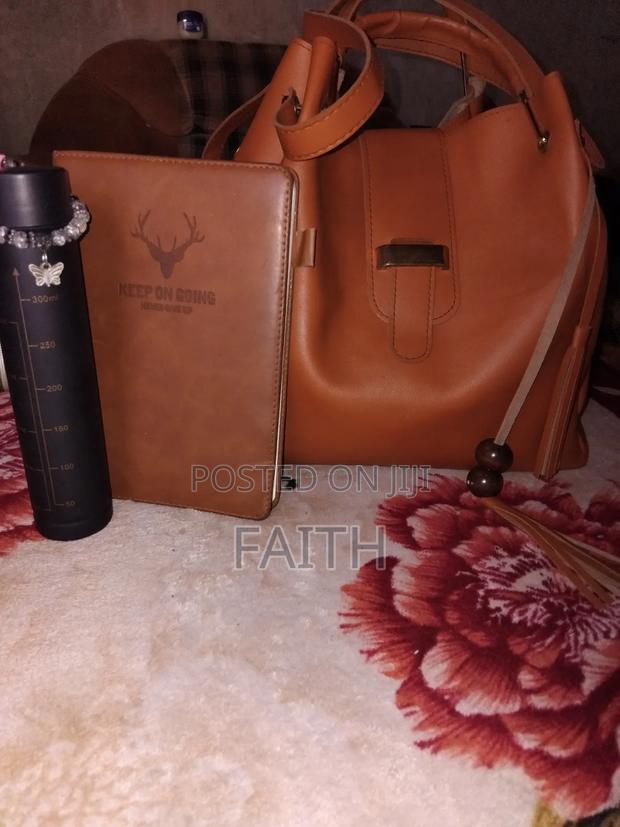 Classy Brown Ladies Handbag Neat and Durable