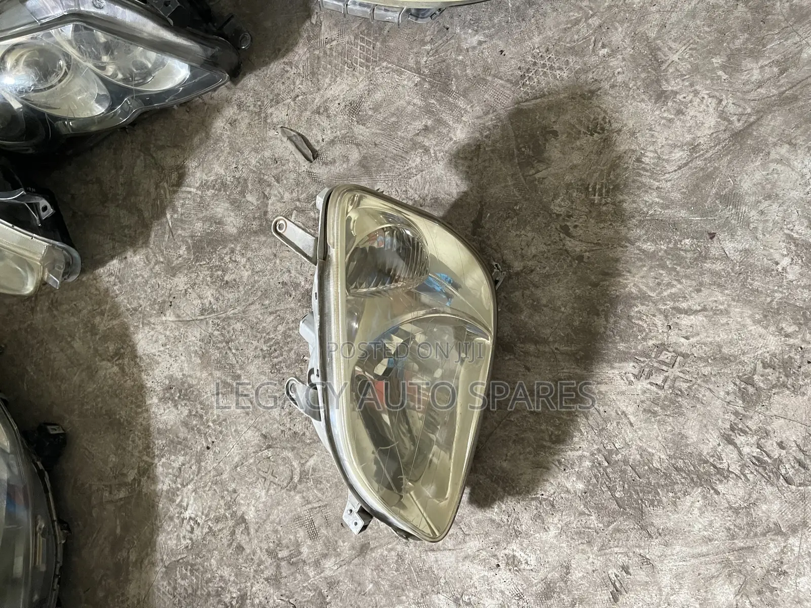 Toyota Raum Headlight