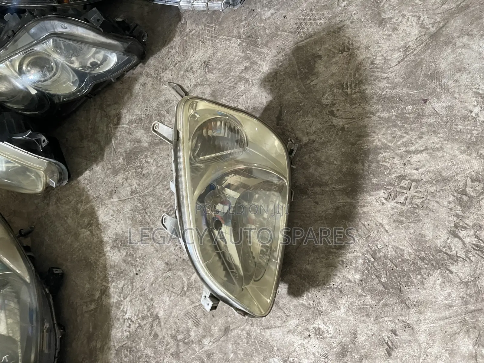 Toyota Raum Headlight