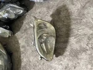 Toyota Raum Headlight