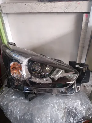Toyota Demio Headlight Inbuilt Part No Z RHS