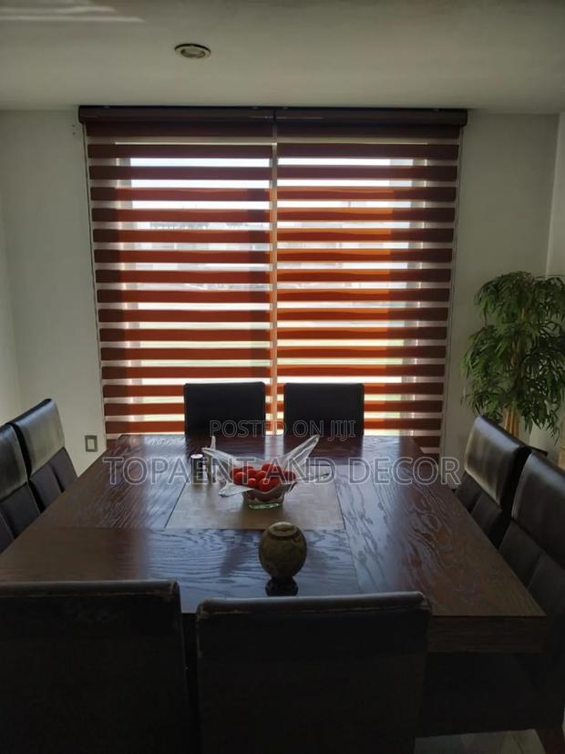 Brown Shade Roller Up Blinds