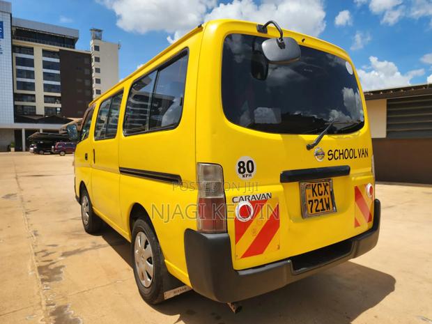 Nissan Caravan (Urvan) 2012 Yellow - thumbnail 7