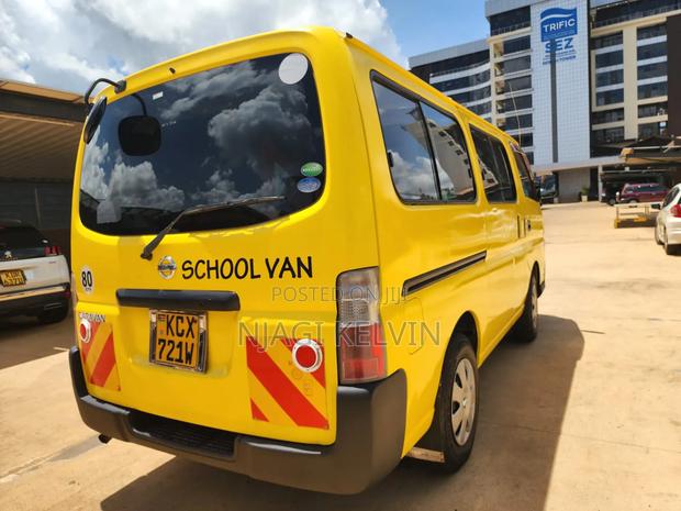 Nissan Caravan (Urvan) 2012 Yellow - thumbnail 8