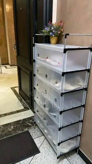 *7-Layer Multifunctional Shoe Rack With a Dustproof Cover.*