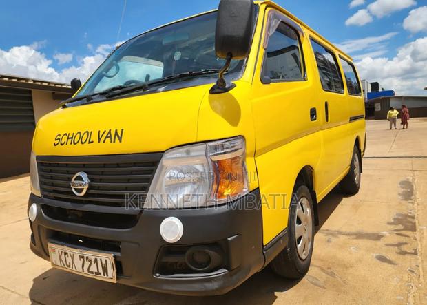 Nissan Caravan (Urvan) 2011 Yellow - thumbnail 3