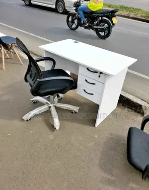 1m Versatile Study Desk With a Black Ergonomic Mesh Chair