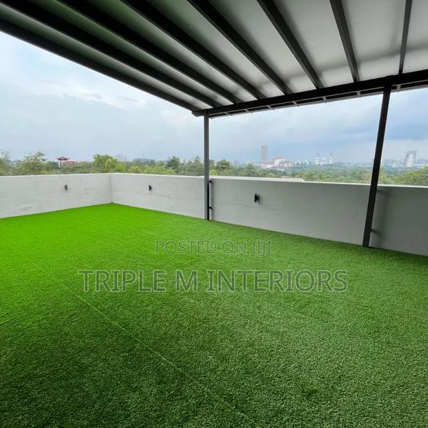 Rooftop Chill Zone With Green Turf