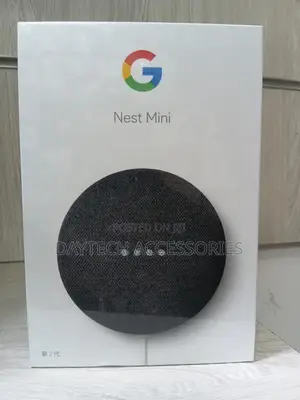 This Is a Google Nest Mini (2nd Generation) Smart Speaker in Charcoal.