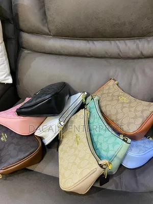 Quality Teri Coach Shoulder Bags Comes in a Dust Bag