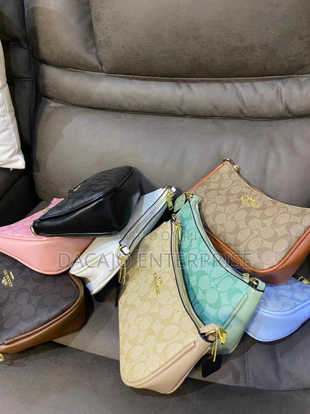 Quality Teri Coach Shoulder Bags Comes in a Dust Bag