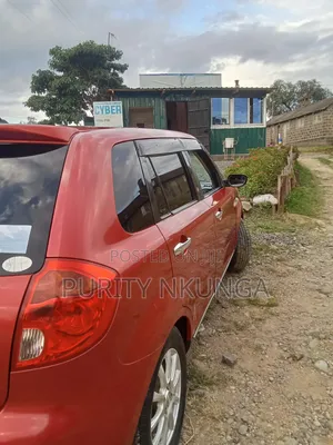 Mazda Verisa 2012 Red