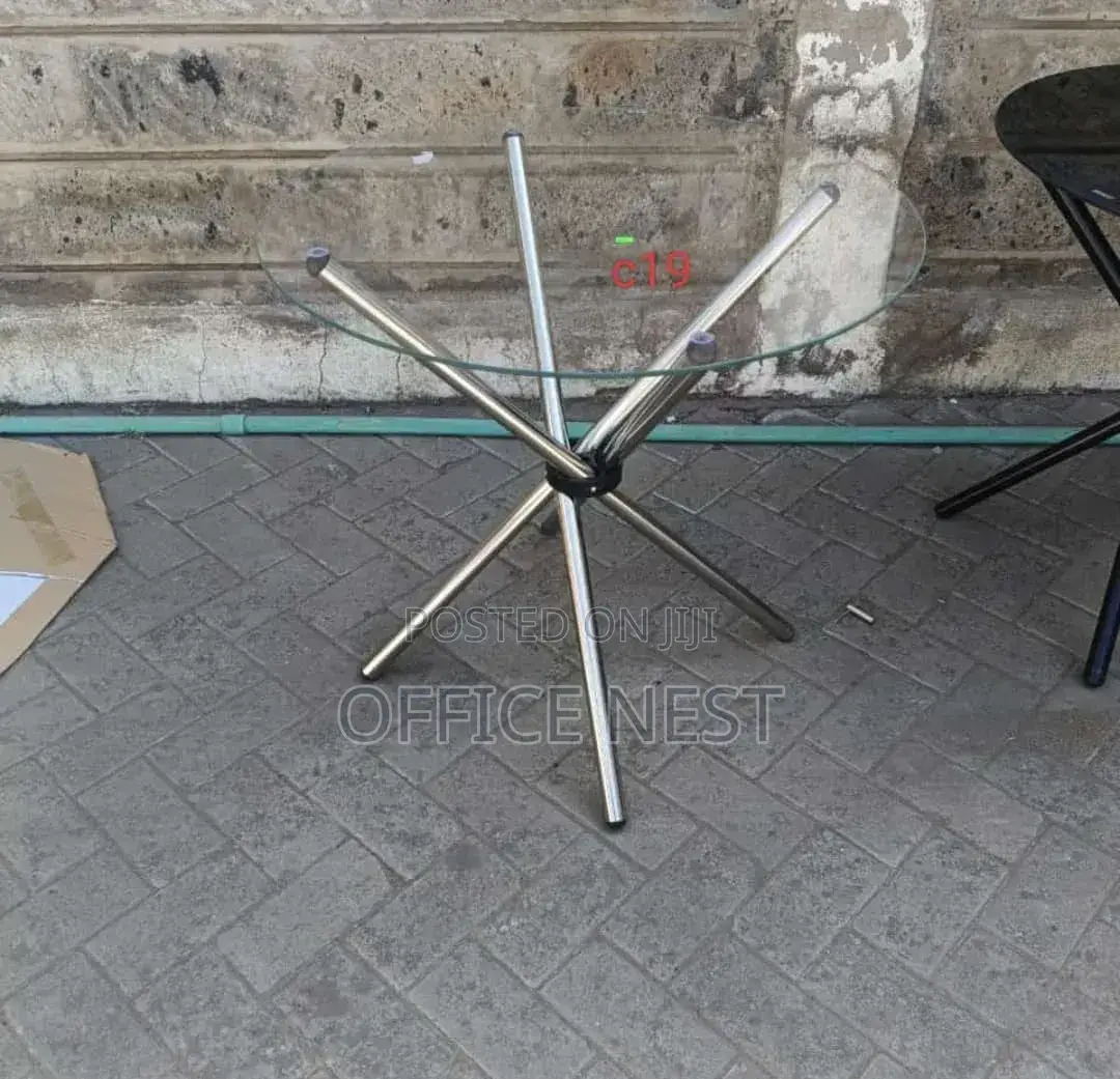Transparent Glass Table With Silver Stand