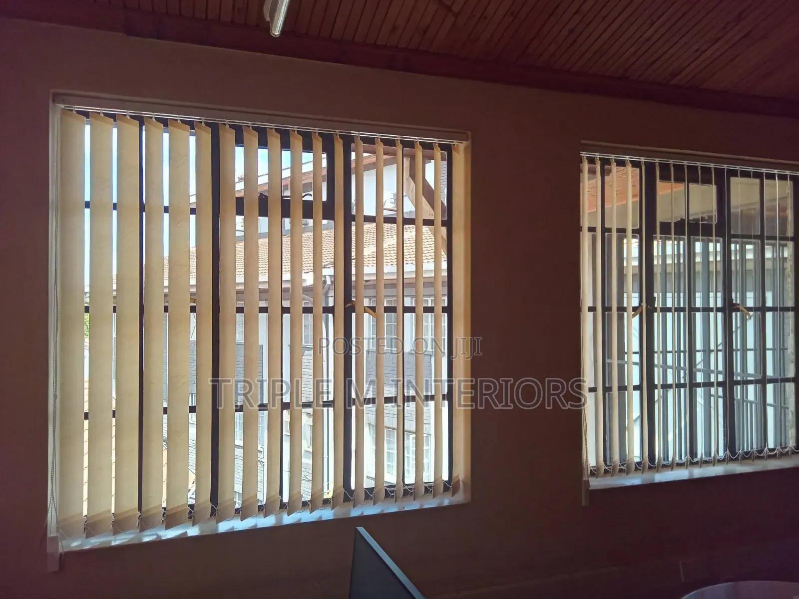 Elegant Sun-Filtering Vertical Blinds for Soft Lighting