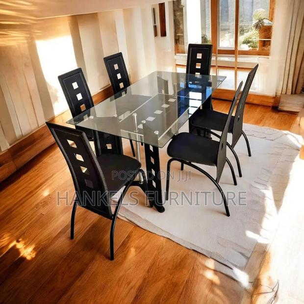 6-Seater Glass Dining Set With Stylish Chairs