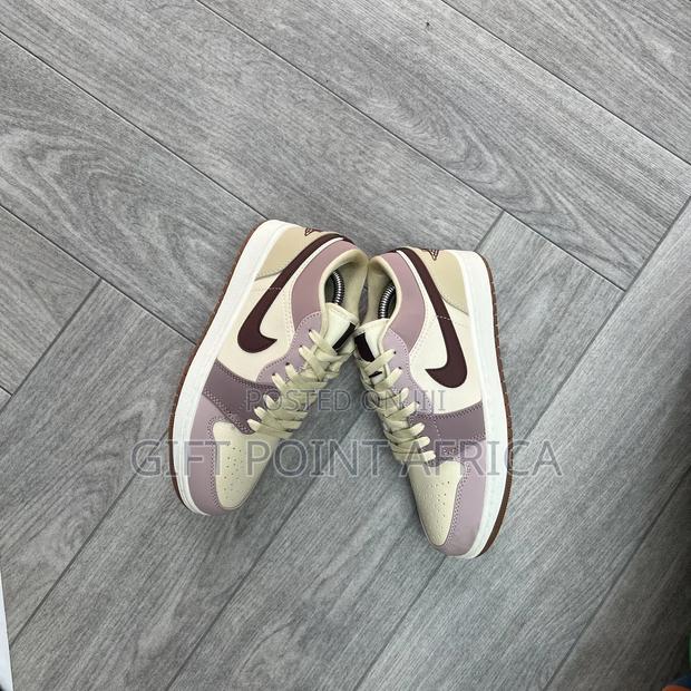 Nike Air Jordan 1 Low Sneakers in the Dark Pony Smoky