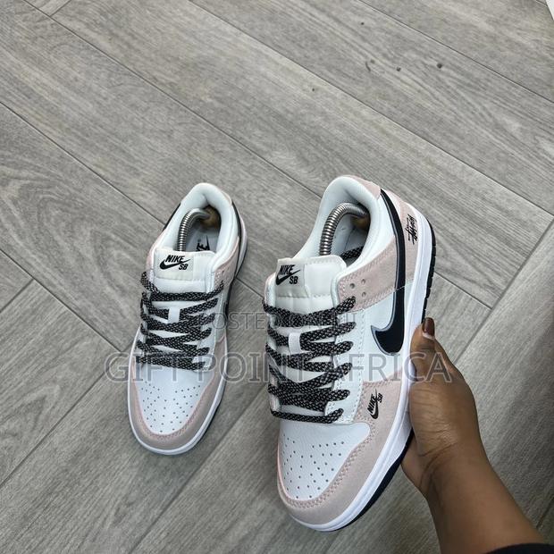 Nike Sb Dunk Low Sneakers in a Pink, Black, and White