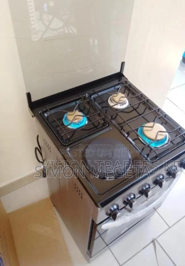 3gas Cooker. 1electric Plate Nunix 3+1 Standing Cooker