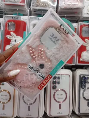 Fluffy Pink Faux Fur Phone Case Is to Fit the Apple iPhone 14 Pro.