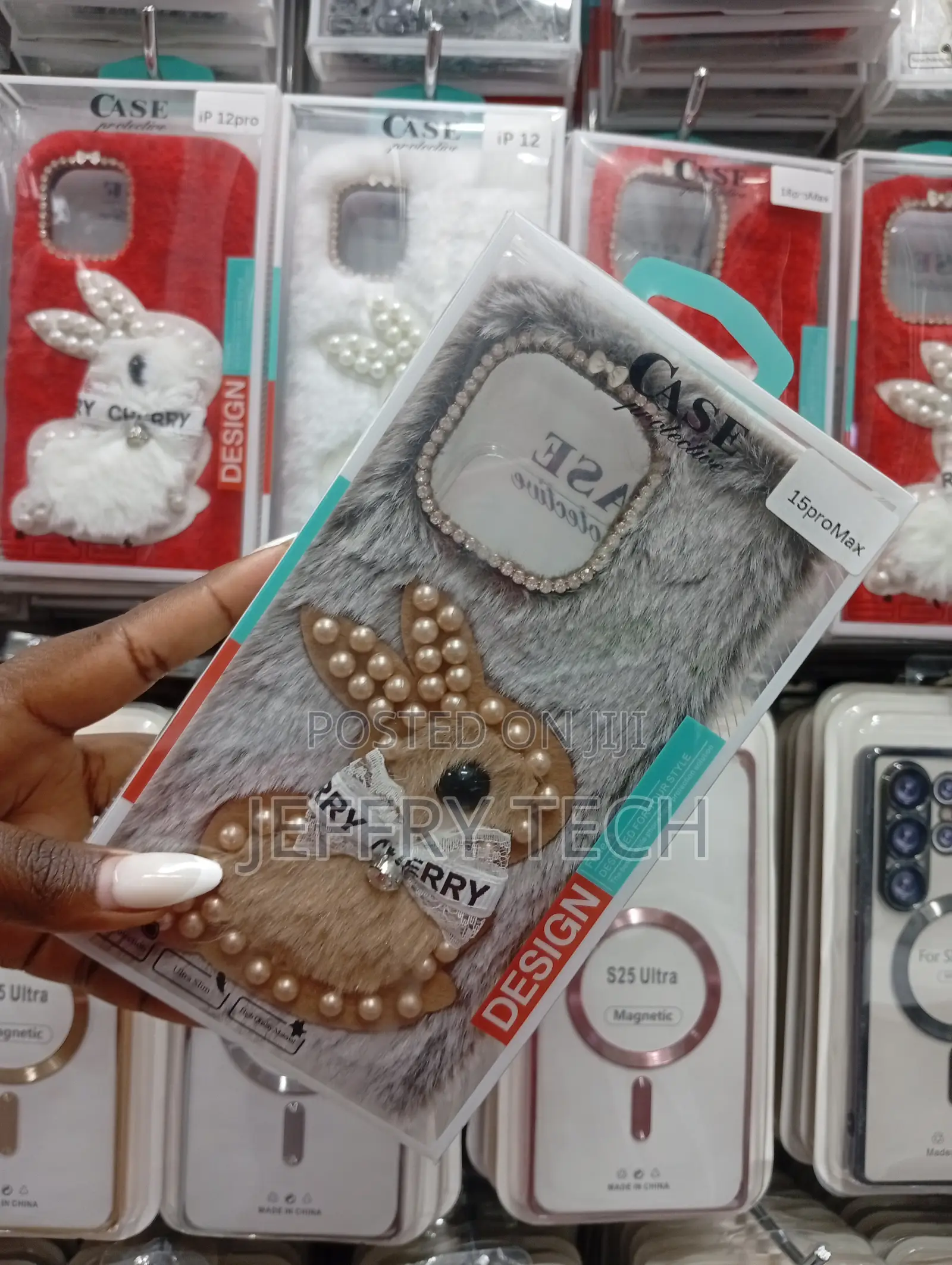 Fluffy Phone Case With a Pearled Is for the iPhone 15 Pro Max.