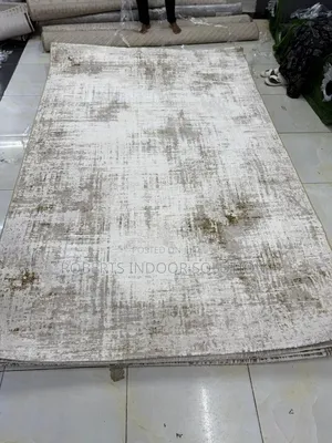White, Beige, and Gold Tones Rug