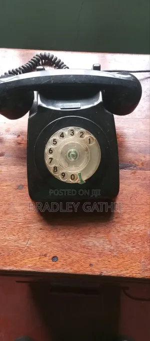 Vintage Rotary Dial Phones – 1950s Black Bakelite + 1970s Two-Tone Set