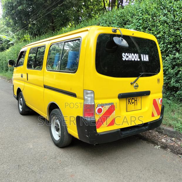 Nissan Caravan (Urvan) 2009 Yellow - thumbnail 2