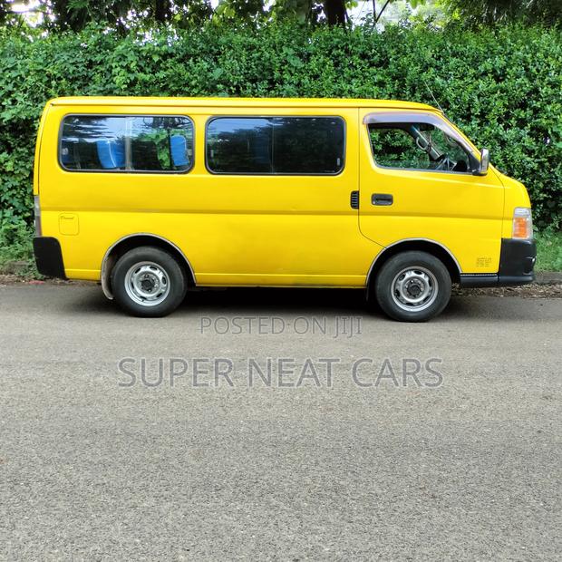 Nissan Caravan (Urvan) 2009 Yellow - thumbnail 3