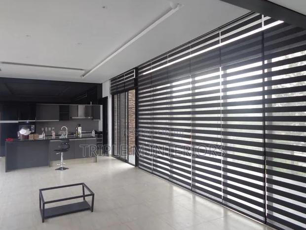 Elegant Pull-Down Blinds for Office Use