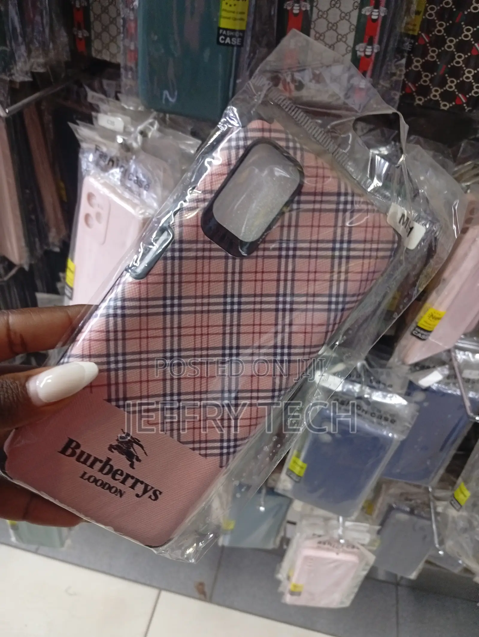 Phone Case Featuring a Plaid Pattern Inspired by the Burberry Brand.