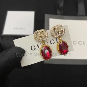 Luxury Red Stone Drop Earrings – Elegant Gold Design