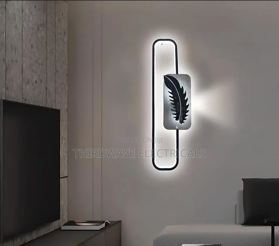 Decorative Led Wall Light Featuring a Black and Silver Feather Design