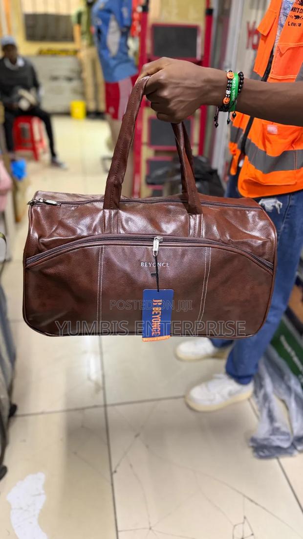 Brown Medium Size Travelling Bag Sleek,Spacious and Quality at 1600 - main view
