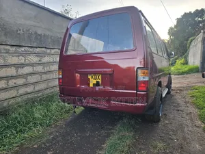 Nissan Caravan (Urvan) 2009 Red