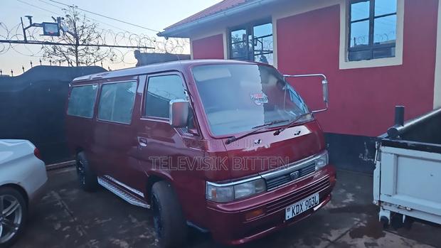 Nissan Caravan (Urvan) 2009 Red - thumbnail 7
