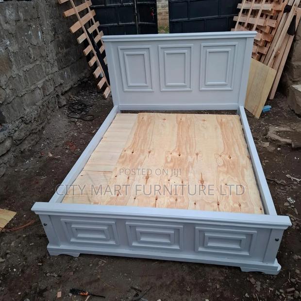 5 by 6 Wooden Bed(Free Delivery)