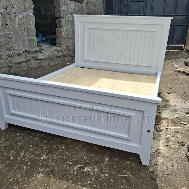 5 by 6 Wooden Bed(Free Delivery