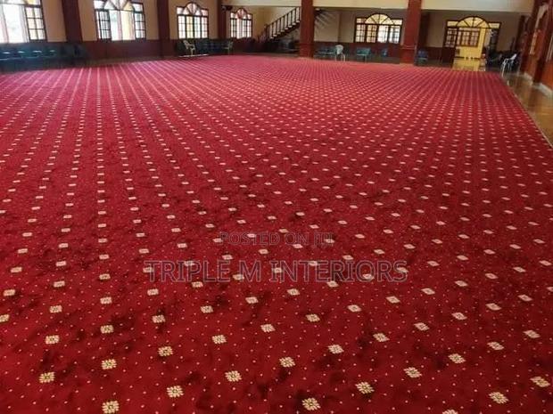 Redefine Your Spaces With Opulent Red Dotted Carpet Finish