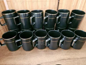 Black Mugs With Gold Line at 200 Each