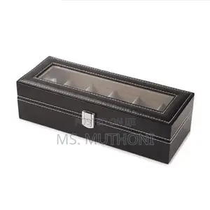Watch Box Features a Transparent Glass Lid and Velvet-Lined Interior