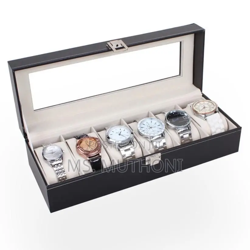 Watch Box Features a Transparent Glass Lid and Velvet-Lined Interior