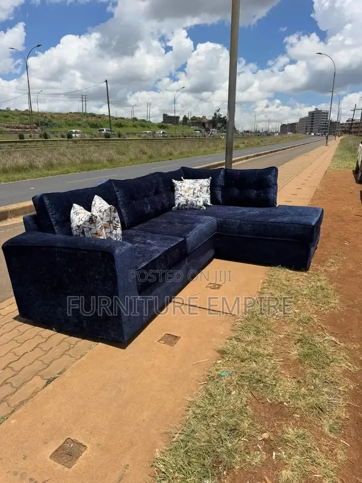 Dark Blue L-Shaped Sectional Sofa With Cushions and Chaise