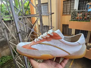 White and Brown Casual Leather Sneakers.