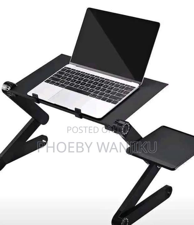 A Laptop Stand/Laptop Stand With Cooling Pads