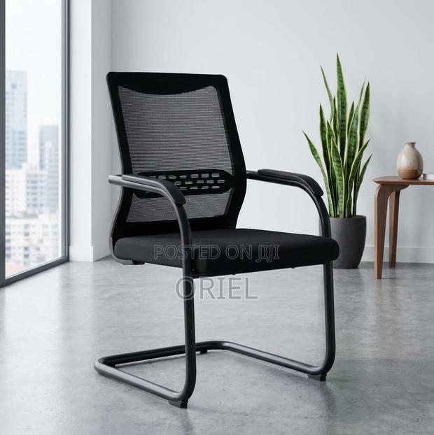 Office Seating Chair : Cushioned Mid-Back Fabric Workspace Chair - main view