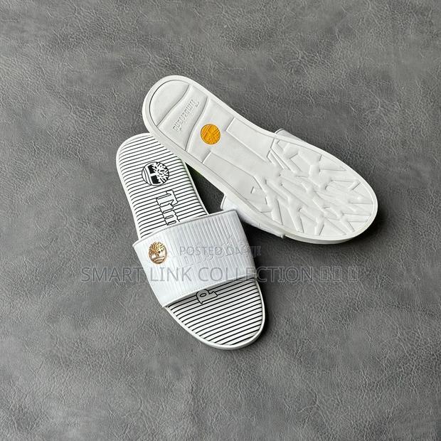 White Timberland Slides