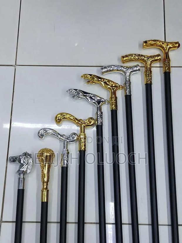 Stylish Pimped Walking Sticks 
With Sword 
Golden/Silver Handless